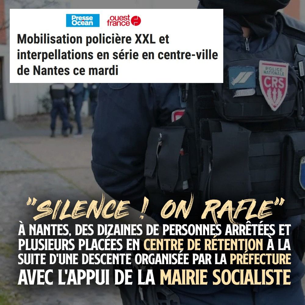 Un CRS monte la garde pendant un contrôle d'identité à Nantes.